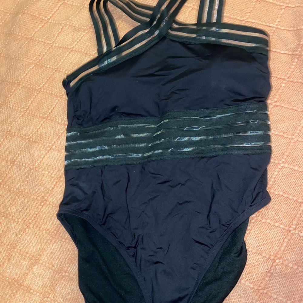 Kenneth Cole crisscross black one piece swimsuit. Only worn once!